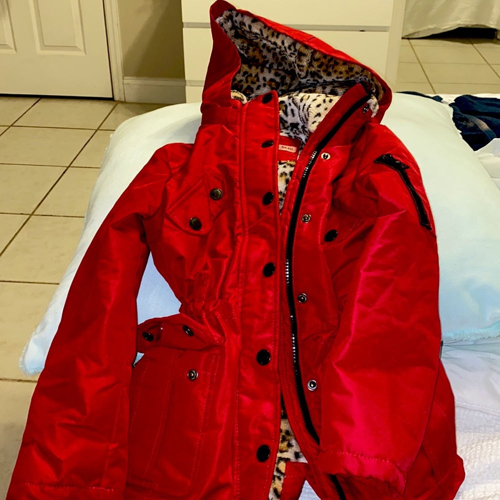 Beautiful red jacket can use as rain jacket with cozy leopard print in coat.